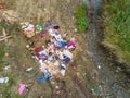 Aerial view of a dirty riverbed, conceptual image of human negligence.