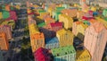 Aerial view of colourful buildings on city street.