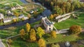 Aerial View of the Dobele City, Ancient Medieval Castle Park With Fontain Latvia. Aerial Panorama of Dobele City Sunny Autumn Day