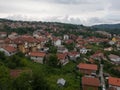 Aerial view of Doboj hilly suburbs from medieval fortress Gradina during overcast summer day