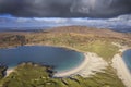 Aerial view on Dog`s bay beach, and Gurteen bay beach, Connemara, county Galway, Ireland. Errisbeg mountain in the background. Royalty Free Stock Photo