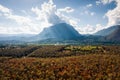 Aerial view of Doi Luang Chiang Dao mountain with autumn colorful forest in national park on bright day