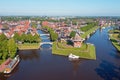 Aerial view on Dokkum with windmills Zeldenrust and De Hoop in the Netherlands