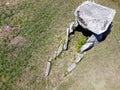 Aerial view of a dolmen, an ancient burial. Anta da Barrosa, Praia de Ancora. Northern Portugal