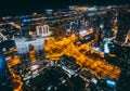 Aerial view of Downtown Dubai with roads, Dubai Mall and the fountain by night, from Burj Khalifa observatory deck in Royalty Free Stock Photo