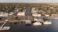 Aerial view of downtown St Marys, Georgia and the St Marys River at sunset