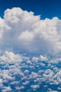 Aerial view of dramatic cloud formation and cityscape below Royalty Free Stock Photo