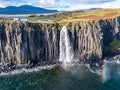 Aerial view of the dramatic coastline at the cliffs by Staffin with the famous Kilt Rock waterfall - Isle of Skye - Royalty Free Stock Photo