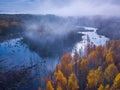 Aerial view of Dreamy foggy autumn landscape over the swamp Royalty Free Stock Photo