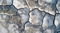 Aerial View of Cracked Dry Mudflats Under the Blazing Summer Sun, Creating an Abstract Pattern of Light and Shadow in Royalty Free Stock Photo