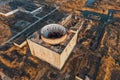 Aerial view from drone of abandoned and ruined Nuclear Power Plant or station, round tower of atomic reactor, large