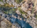 Aerial view of drone, artificial lake and dense forest on the banks Royalty Free Stock Photo