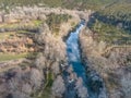 Aerial view of drone, artificial lake and dense forest on the banks Royalty Free Stock Photo