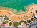 Aerial  view from a drone of the beach on the Ein Bokek embankment on the coast of the Dead Sea and the sea itself, in Israel Royalty Free Stock Photo