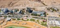 Aerial view from a drone of the beach on the Ein Bokek embankment on the coast of the Dead Sea and the sea itself, in Israel Royalty Free Stock Photo