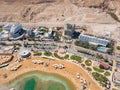 Aerial view from a drone of the beach on the Ein Bokek embankment on the coast of the Dead Sea and the sea itself, in Israel Royalty Free Stock Photo