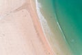 Aerial view with drone of a beach in wave of turquoise sea water shot, top view of beautiful white sand background. Holidays Royalty Free Stock Photo