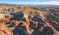 Aerial view from drone of a beautiful rise of red and orange rock formations due to erosion on the Toadstool Trail in