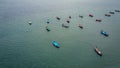 Aerial view from drone of Colorful long tail boats in the middle of the sea Royalty Free Stock Photo