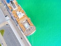 Aerial View by Drone of Cruise ship at harbour. Top view of beautiful large white liner in yacht club. Luxury cruise in sea water. Royalty Free Stock Photo