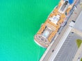 Aerial View by Drone of Cruise ship at harbour. Top view of beautiful large white liner in yacht club. Luxury cruise in sea water. Royalty Free Stock Photo