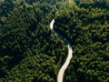 Aerial view of curve road on the mountain with green forest in Greece Royalty Free Stock Photo