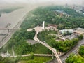 Aerial view from drone, early foggy morning, pedestrian-bicycle bridge in Kiev Royalty Free Stock Photo