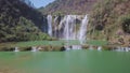 Aerial view drone flight above Jiulong waterfall in Luoping, Yunnan, China