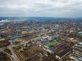 Aerial view from drone of industrial zone with fuming chimneys. Chemical plant