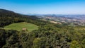 Aerial view of italian countryside at sunset with sun beams Royalty Free Stock Photo