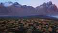 Aerial view drone landing, Vestrahorn mountain at sunset, Stokksnes, Iceland