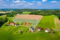 Aerial view from the drone of landscape of the German countryside. Agricultural fields, villages, and woodlands