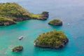 Aerial view from the drone on the landscape tropical island with palm trees and turquoise sea with boats. Summer vacation concept Royalty Free Stock Photo