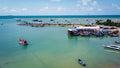 Aerial view from drone of Long tail pier in summer, Industrial cargo port under blue sky Royalty Free Stock Photo