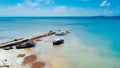 Aerial view from drone of Long tail pier in summer, Industrial cargo port under blue sky Royalty Free Stock Photo