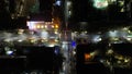 Aerial view from a drone at a night intersection