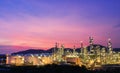 Aerial view drone of oil storage tank with oil refinery factory industrial. Oil refinery plant at beautiful sky sunset and Royalty Free Stock Photo