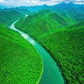 Aerial view drone photo shows a river in Southeast Asia with a lush tropical vegetation and mountains in the