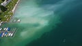 Aerial view with a drone of Plansee with water discoloration caused by the bathers