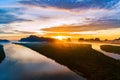 Aerial view drone shot of beautiful ocean against sky in the morning fog mist sunrise drone is flying over sea and mangrove forest Royalty Free Stock Photo