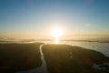 Aerial view drone shot of beautiful sunrise sky in the morning fog mist sunrise drone is flying over lake forest Landscape High Royalty Free Stock Photo