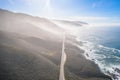 Aerial View Drone Shot of Highway Pacific Coast Highway California USA Big Sur Mountains Ocean Fog Sun Royalty Free Stock Photo