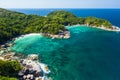 Aerial view drone shot ocean waves, Beautiful tropical beach and rocky coastline and beautiful forest. Nga Khin Nyo Gyee Island