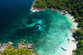 Aerial view drone shot ocean waves, Beautiful tropical beach and rocky coastline and beautiful forest. Nga Khin Nyo Gyee Island