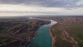 Drone shot of river Ili and spring steppe in Kazakhstan