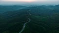 aerial view drone shot ROAD No.1081 or shape number three of winding mountain road between Pua District, Nan Province, Thailand is