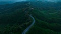 aerial view drone shot ROAD No.1081 or shape number three of winding mountain road between Pua District, Nan Province, Thailand is