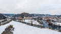 Aerial view from drone of town view of market KallmÃÂ¼nz Kallmuenz in Bavaria and bridge over river Naab and castle ruin in winter