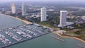 Aerial View by Drone of Yacht Club and Marina. Top view of yacht club. White boats in sea water. Marina dock yachts and Royalty Free Stock Photo