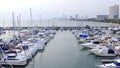 Aerial View by Drone of Yacht Club and Marina. Top view of yacht club. White boats in sea water. Marina dock yachts and Royalty Free Stock Photo